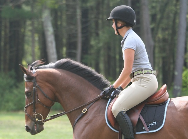 After competing in hunter/jumpers, she realized her heart longed to sit up straight and ride like the wind on a Thoroughbred.