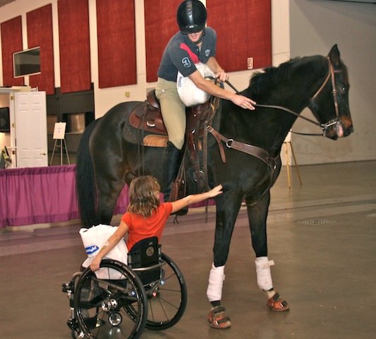 Thoroughbreds work for the Square Peg Foundation to aid children of all abilities. Photo courtesy Abilities Conference