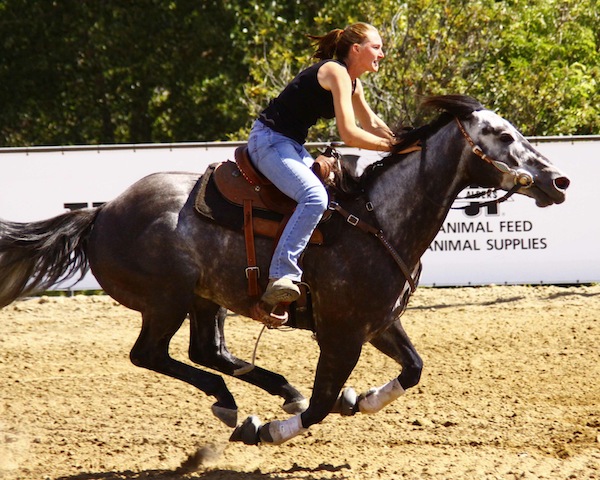 Blitz races for the finish as a barrel horse