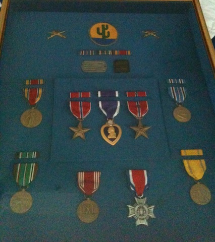 Ann keeps her father's medals framed, in a place of honor