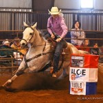 Rider Lindsay Jensen barrel racers her OTTB mare. She is among 12 trainers competing in the August event