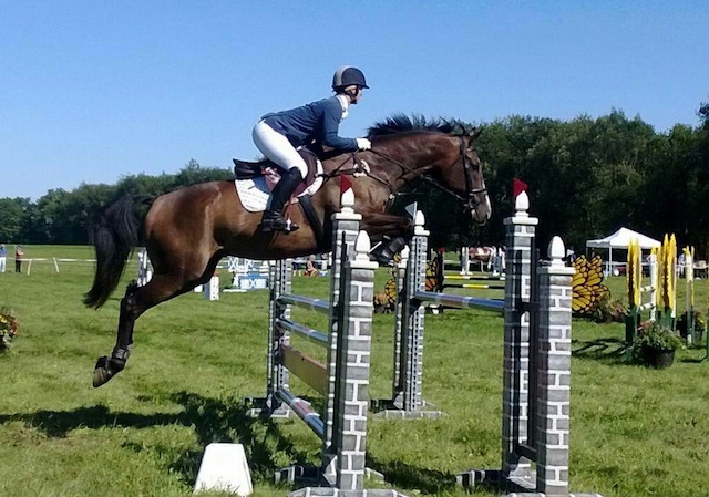 Leah Lang-Gluscic and AP Prime power through the showjumping competition at the Richland CIC**