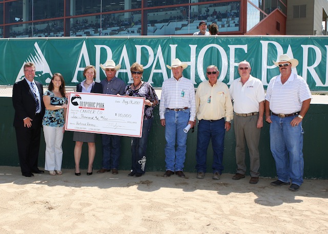 CANTER Colorado receives $10,000. Pictured, L-R,Bruce Seymore (general mgr Arapahoe), Jamie Girouard (CANTER), Corey Kaye (CANTER) the others are members of the Colorado Horse Racing Association and not all identified: , ?, Sandy Miller, ?, ?, Bill Powers, Shannon Rushton. Photo by Coady Photography
