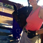 Jan Vandebos of RanJan Racing enjoys some quality time with her 14-year-old OTTB