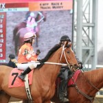 Smalltownman heads to the winner's circle with Jackie Acksel up