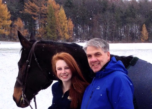 James Hastie, new executive director of the Thoroughbred Aftercare Alliance, with his cousin Haley Bell and her favorite OTTB, Sport.