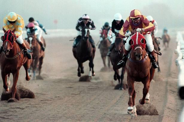Jones on the rail won a race in his later years. Photo courtesy of the Estate of David T. Jones