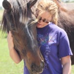 Sir Prize Birthday, who officially turns 34 in May, enjoys a snuggle with volunteer Valerie Wasail at Wallkill Correctional Facility in New York. Photo by Cody Jo Wasail