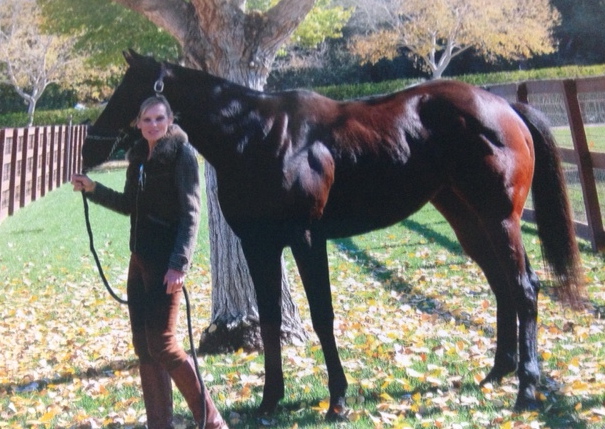 Jan Vandebos poses with Diorella, a prized filly she could not let die from a fractured skull.