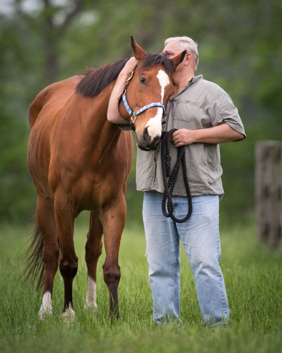 Ron Krajewski poses with his famous painting horse, Metro Meteor. Photo courtesy Wendy Wooley/ Equi Sport Photo