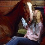 Lauren Wink and Zealous Blonde, the horse she named as a foal, and searched for, only to find her rescued from slaughter and at Mindy Lovell's farm.