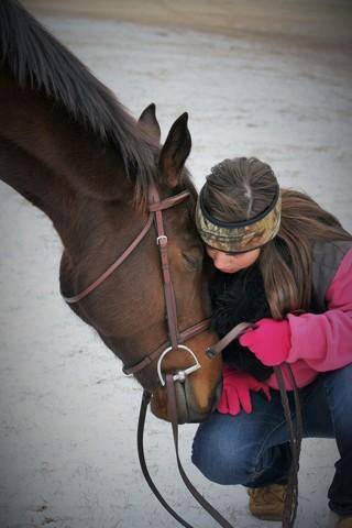 Lexy Small and her favorite hunter/jumper share a quiet moment.