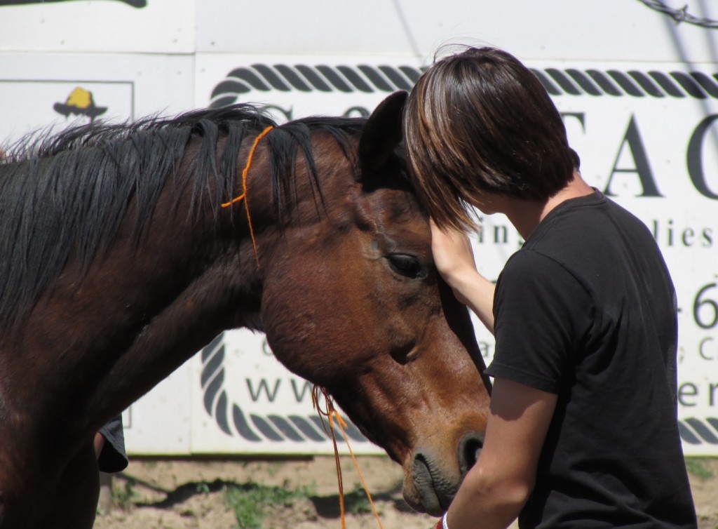 A foster child has a life-changing experience after connecting with a Thoroughbred in California. Photo courtesy Julie Baker
