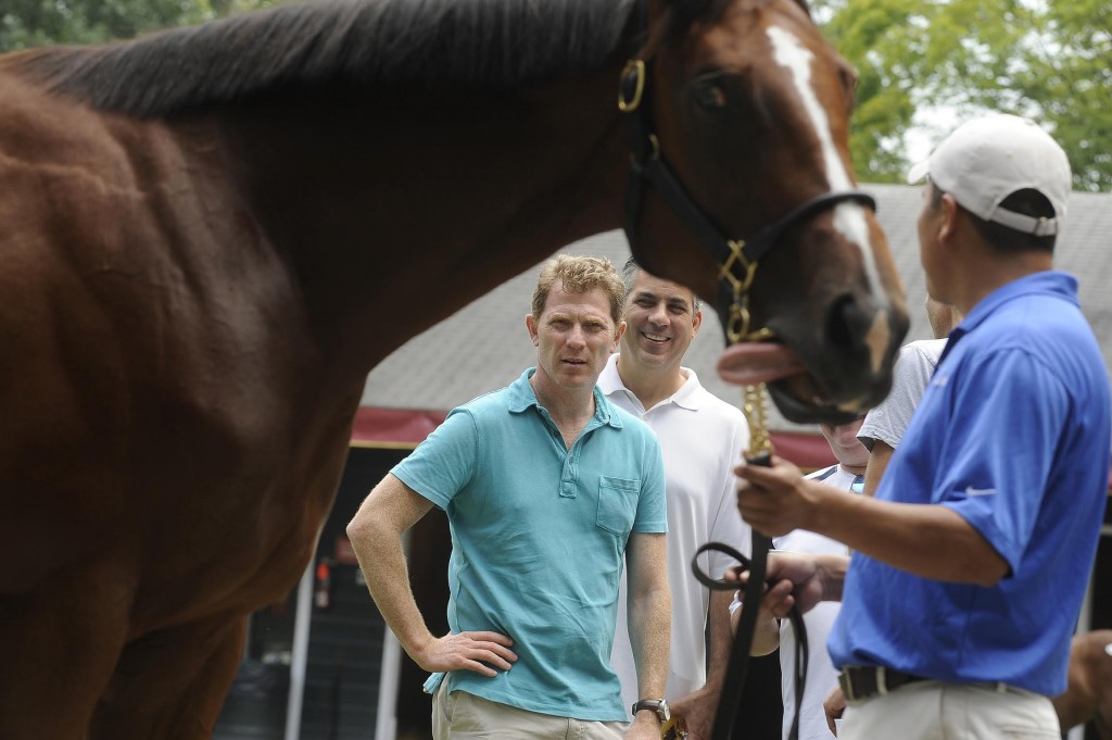 Celebrity chef Bobby Flay inspects horses at Fasig Tipton August Sale, Saratoga Springs, N.Y. A Horsephotos image