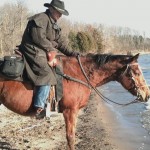 Prince of Rhodes and owner/rider Ed Schlairet enjoy a relaxing moment at the water's edge.