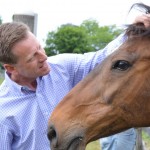 C.L. Rib communes with Hall of Fame jockey Richard Migliore of the Thoroughbred Retirement Foundation.