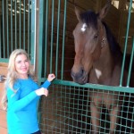 Dreux Flaherty of Dallas meets her new horse, War Chant son Cease.