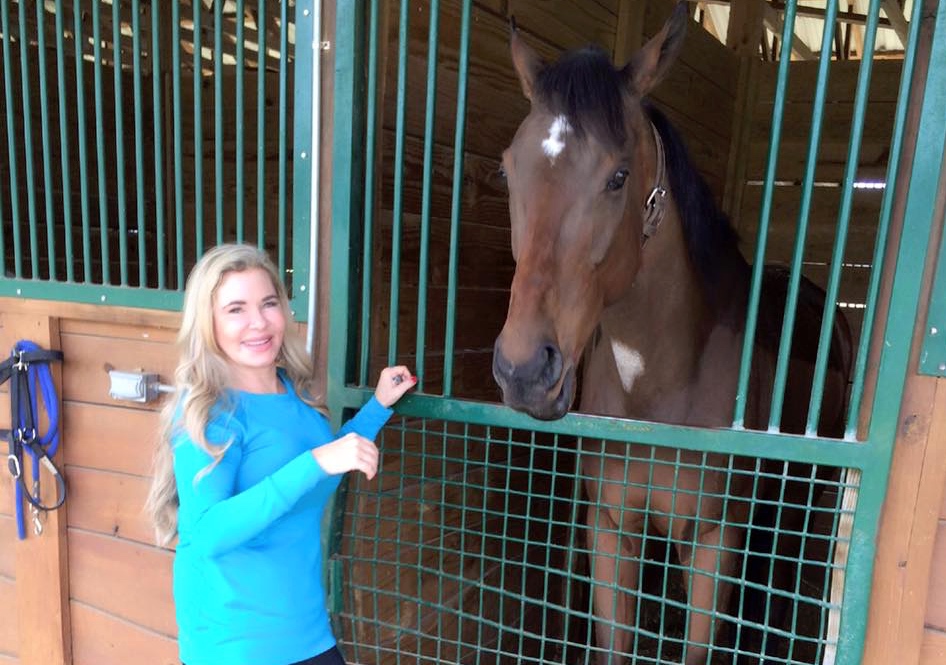Dreux Flaherty of Dallas meets her new horse, War Chant son Cease. 