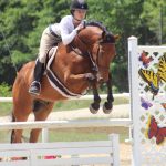 Atom is schooled by junior rider Teresa Tolar.Photo by Jessica West