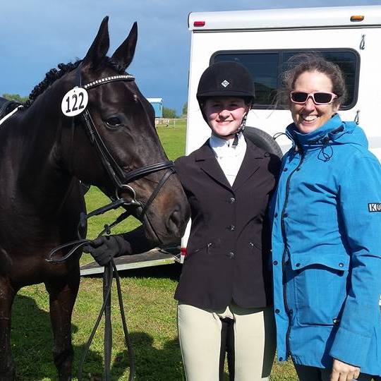 USDF gold medalist Barbara Strawson, right, has been a great mentor for Emily and Mo.