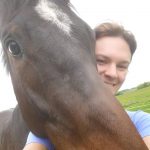 Leah Lang-Gluscic attempts to grab a selfie with her new Thoroughbred Joker's Hat as the 4-year-old insists on a snuggle!