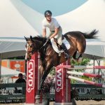 Grant Chungo, 21, of Virginia trains his OTTB Ballinure with Olympic champion Joe Fargis. Photo by Hoof Print Images and courtesy Chungo