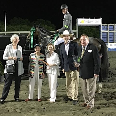 Thoroughbred Retirement Foundation President Lenny Hale, far right, presented the first in a series of TRF-Outstanding Thoroughbred Jumper Awards last week. OTTB Ballinure and rider Grant Chungo were recipients.