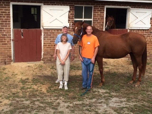 Bob and Cathy Hartsock were so thrilled to discover Ollie was safe that they spent the entire day with him at the TRF. They are pictured with Ollie and inmate William, Ollie's caretaker.